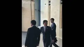 Chinese negotiator Li Chenggang seen leaving after 2nd day of US trade talks in Kuala Lumpur