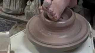 Our Pottery Teacher throwing a bowl with his feet
