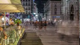 People walking in the Old city center of Vienna in Stephansplatz night timelapse