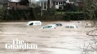 Storm Dennis: cars swept away by flooding in Wales
