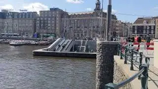 Watching people take their bikes into Centraal Station in Amsterdam