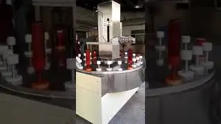 reciprocator spray painting plastic water bottle's surface