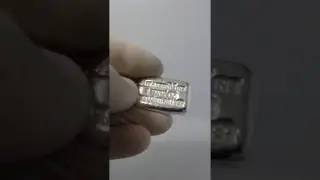 1 oz hand poured 999 fine silver Atlantis Mint bar