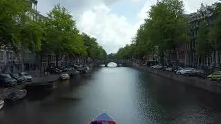 Scenic Canal Boat Ride in Amsterdam