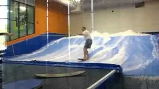 Alan surfs flowrider standing up at Fantasy Surf in Kissimmee Florida 4