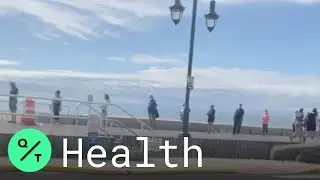 People Line Up For Beach Access Badges At New Jersey Shore Before Memorial Day Weekend