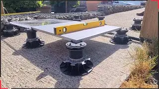 Pose d'une terrasse en carrelage sur plot autonivelant Jouplast