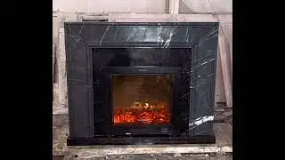 Modern fireplace mantel in marble Nero Marquina