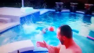 Wow look at that he is good at basketball on the pool when he's on the hot tub is good 