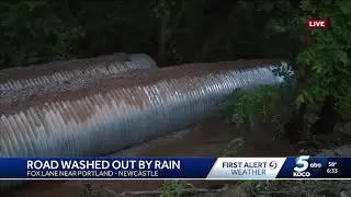 Heavy rainfall washes away Newcastle road