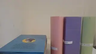 Science project testing how strong are paper pillars