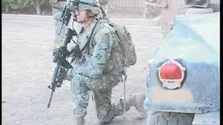 Iraqi Army Sons Of Iraq Secure Baghdad Neighborhood