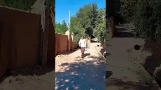A man passing through the historical streets of Taft  #Yazd #Yazdtour #Yazdcity #Taft #Yazdtourism