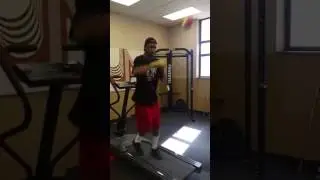 Running backwards on treadmill with reaction ball hat
