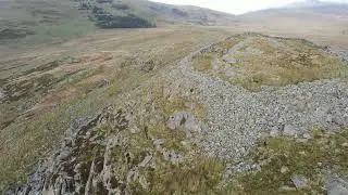 Drone flight over Craig Y Ddinas Roman Hill Fort, Talybont