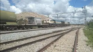 Tyakal hills in the background : WDG4 twins hauling oil tankers skip scenic Tyakal railway station !