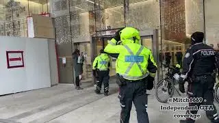 Police Block Protester From British Consulate Entrance 