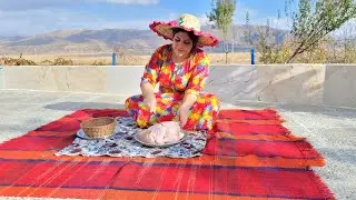 Cooking chicken with mountain herbs in a traditional Iranian village