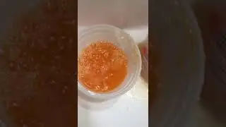 Pouring expired koolaid with water experiment
