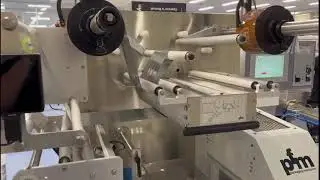 Emrich Packaging Machinery - PFM Bora Servo Wrapper + End Load Cartoner - Chocolate Blocks