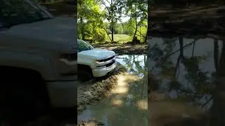 My cousin's lifted 2016 Silverado in lake Michigan at the mounds September 19th 2021.