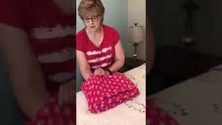 Folding a Vera Bradley travel blanket made easy