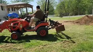 Moving some dirt with the Kioti CS2220.