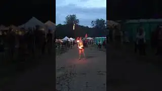 Fire twirler in Nelsonville Music Festival