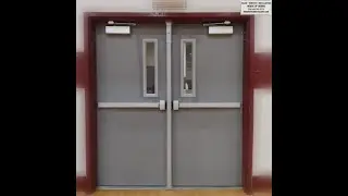 Pair of commercial fire doors and hardware sold & installed by House of Doors