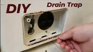 Washing machine drain trap cleaning