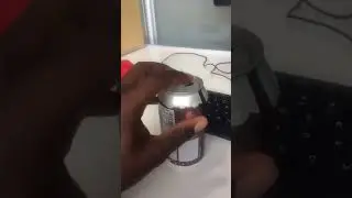 Opening off brand root beer in a library