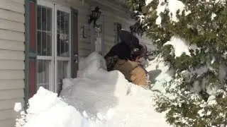 Beware of snow falling from roofs