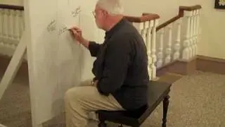 Ron Powers Signs the Fence!