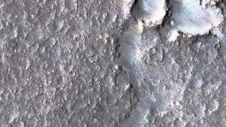 Mars: Hints of an Ancient Shoreline in Southern Isidis Planitia