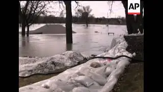 A weeklong fight against flooding is nearing its climax in Fargo, N.D., with miles of sandbags and c
