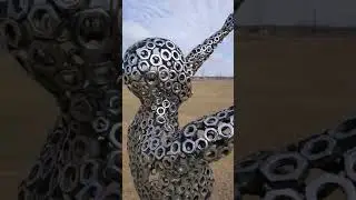Figure Sculpture Made From Polished Stainless Steel Hex Nuts