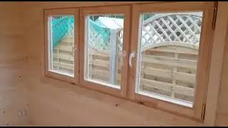 Садовый домик с навесом из профилированного бруса