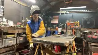 Chasing the welds to my propane forge stand.