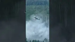 VIH S-92A dropping water on a fire