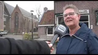 Wijzerplaat Wijkertoren in Beverwijk van slag
