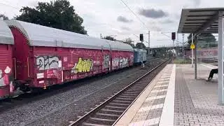 S6 nach Friedberg(Hess) und 145 009 von RBH Cargo mit Autotransportwaggons am Bahnhof Langen(Hess)