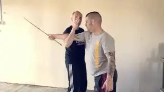 BLOCKING A WEAPON SWING - OVERHEAD