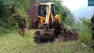 JCB Backhoe Loader for Hilly Villagers Narrow New Road Construction