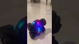It comes to watch controller and a remote controller. The name of the car is 2.4 GHZRC
