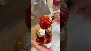 Trying the &AElig;bleskiver danish pancake donuts in Solvang, California