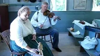 Limberjack dances to the tune played by fiddler Eric Marten