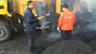 pavement hole road pothole repair machine operation with asphalt or bitumen hot mixing 