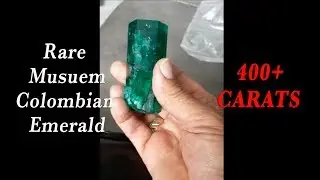 Rare 400+ ct rough Colombian emerald with ideal saturation and excellent hexagonal crystal formation