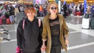 Bella Thorne Holds Hands With Sister Jetting Out Of LAX