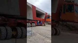 Ultimate Bridge Deck Transporter: Massive Vehicle with Multiple Wheels!